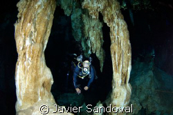 cave diver in 2 ojos cenote by Javier Sandoval 